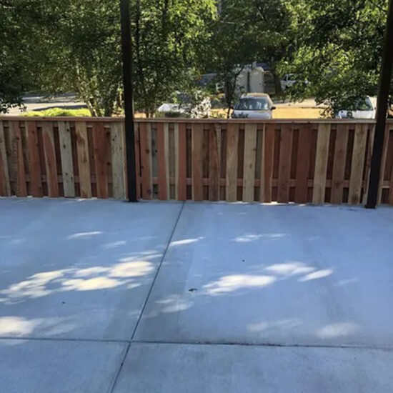 Wood fence installation on patio