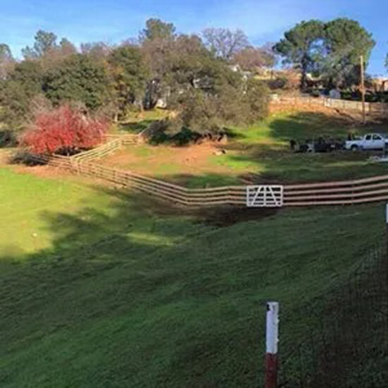 Wooden ranch fence with gate