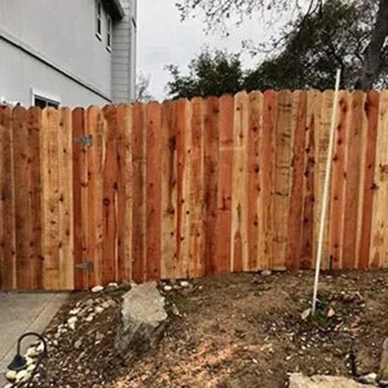 wood privacy fence installation backyard