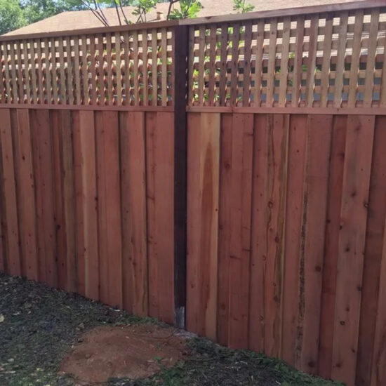 Wood privacy fence installation