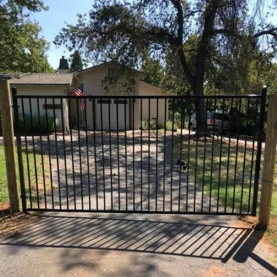 Black metal driveway gate fence