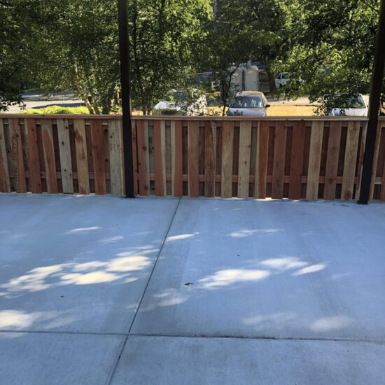 New wooden fence installation