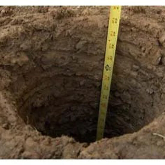 Fence post hole measuring depth