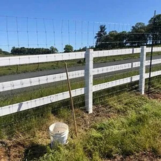 white ranch fence installation field