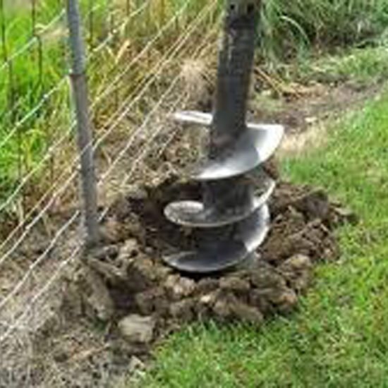 Fence post hole auger drilling
