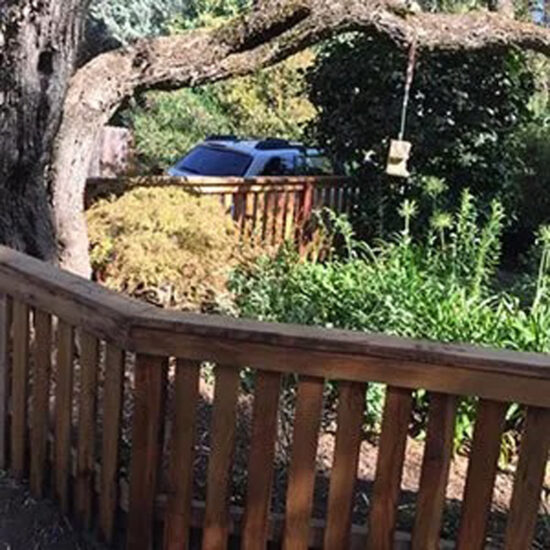 Wood fence installation in backyard