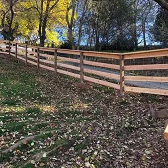 wood fence installation in yard